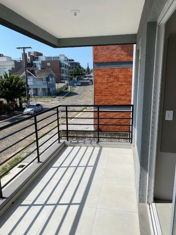 Ótimo apto a 50 m da areia churrasqueira 2Q 2 banheiros 202, Torres (preços atualizados 2026), na 176 Rua Nossa Senhora dos Navegantes em Torres/RS — foto 9