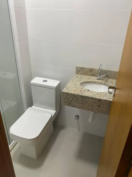 Ótimo apto a 50m da areia churrasq 2Q 2 banheiros 302, Torres (preços atualizados 2026), na 176 Rua Nossa Senhora dos Navegantes em Torres/RS — foto 8