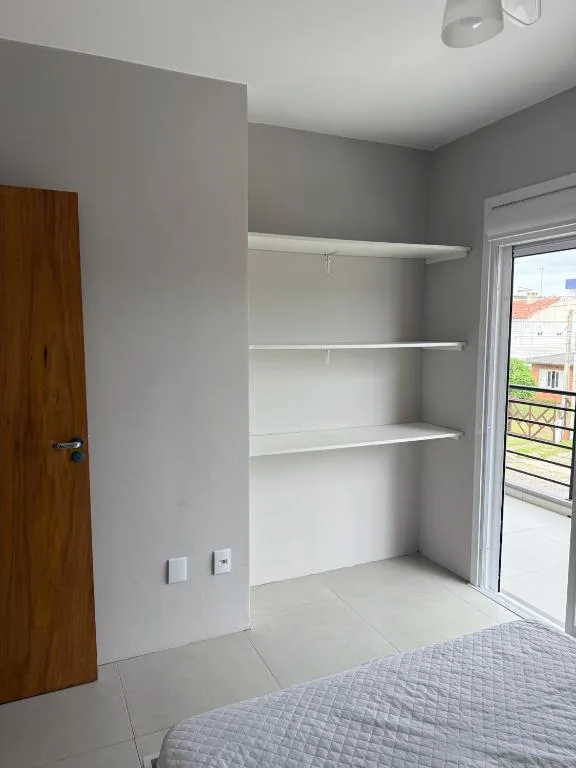 Ótimo apto a 50m da areia churrasq 2Q 2 banheiros 302, Torres (preços atualizados 2026), na 176 Rua Nossa Senhora dos Navegantes em Torres/RS — foto 11