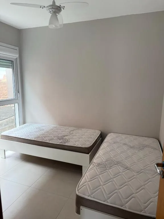 Ótimo apto a 50m da areia churrasq 2Q 2 banheiros 302, Torres (preços atualizados 2026), na 176 Rua Nossa Senhora dos Navegantes em Torres/RS — foto 15