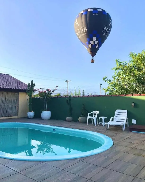 Bangalô em frente a reserva ecológica e 300m do mar, Torres (preços atualizados 2026), na Rua das Figueiras em Torres/RS — foto 33
