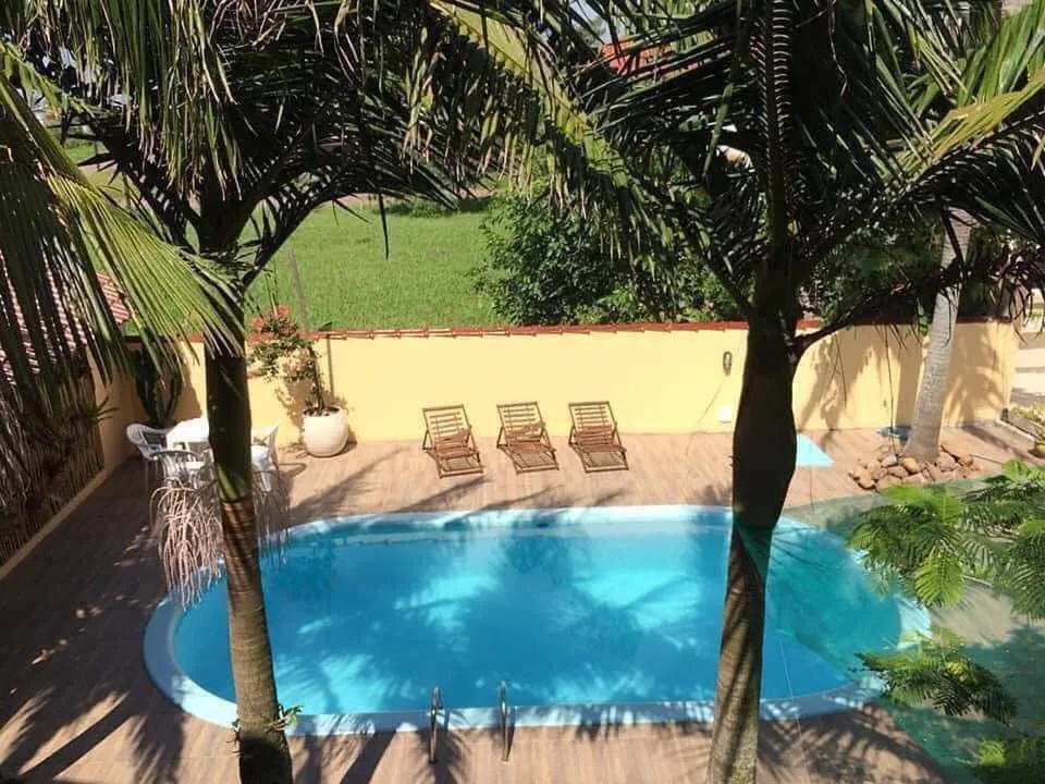 Bangalô em frente a reserva ecológica e 300m do mar, Torres (preços atualizados 2026), na Rua das Figueiras em Torres/RS — foto 35
