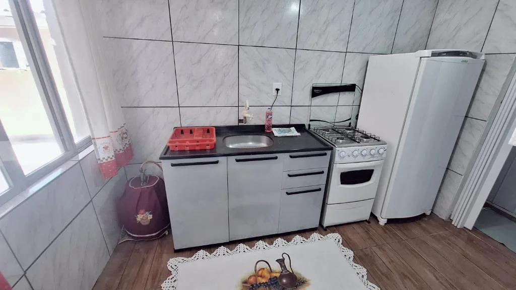 CASA de 2 quartos com 2 ares-condicionados em TORRES-RS - Na mais bela praia Gaúcha - Cozinha - Banheiro - TV smart 32 e Wi-Fi - Estacionamento - Anfitriã Superhost no BnB, Torres, na 1240 Rua Luíz Gonzaga Capaverde casa em Torres/RS — foto 18