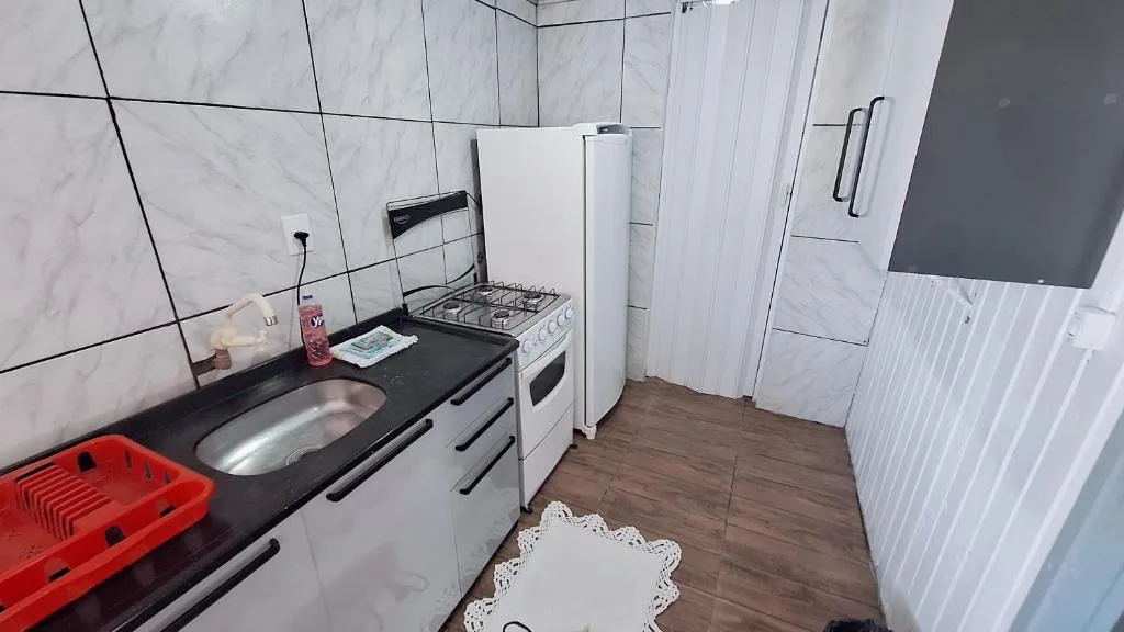 CASA de 2 quartos com 2 ares-condicionados em TORRES-RS - Na mais bela praia Gaúcha - Cozinha - Banheiro - TV smart 32 e Wi-Fi - Estacionamento - Anfitriã Superhost no BnB, Torres, na 1240 Rua Luíz Gonzaga Capaverde casa em Torres/RS — foto 19