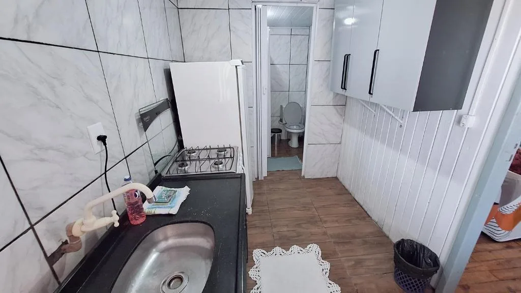 CASA de 2 quartos com 2 ares-condicionados em TORRES-RS - Na mais bela praia Gaúcha - Cozinha - Banheiro - TV smart 32 e Wi-Fi - Estacionamento - Anfitriã Superhost no BnB, Torres, na 1240 Rua Luíz Gonzaga Capaverde casa em Torres/RS — foto 20