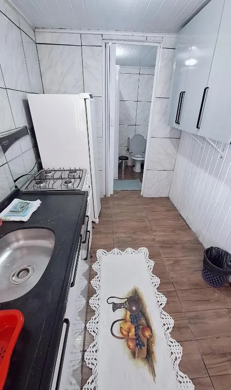 CASA de 2 quartos com 2 ares-condicionados em TORRES-RS - Na mais bela praia Gaúcha - Cozinha - Banheiro - TV smart 32 e Wi-Fi - Estacionamento - Anfitriã Superhost no BnB, Torres, na 1240 Rua Luíz Gonzaga Capaverde casa em Torres/RS — foto 21