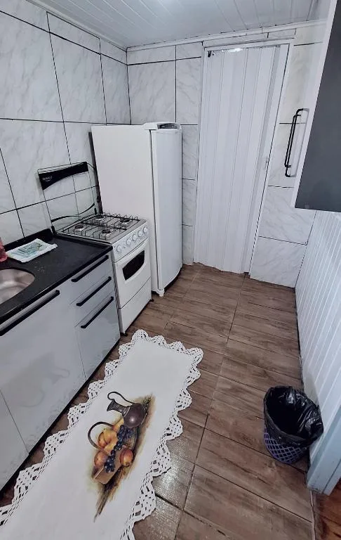 CASA de 2 quartos com 2 ares-condicionados em TORRES-RS - Na mais bela praia Gaúcha - Cozinha - Banheiro - TV smart 32 e Wi-Fi - Estacionamento - Anfitriã Superhost no BnB, Torres, na 1240 Rua Luíz Gonzaga Capaverde casa em Torres/RS — foto 22