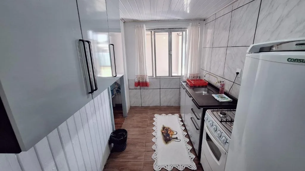 CASA de 2 quartos com 2 ares-condicionados em TORRES-RS - Na mais bela praia Gaúcha - Cozinha - Banheiro - TV smart 32 e Wi-Fi - Estacionamento - Anfitriã Superhost no BnB, Torres, na 1240 Rua Luíz Gonzaga Capaverde casa em Torres/RS — foto 23
