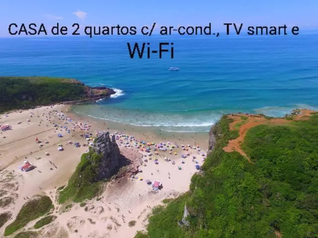 CASA de 2 quartos com 2 ares-condicionados em TORRES-RS - Na mais bela praia Gaúcha - Cozinha - Banheiro - TV smart 32 e Wi-Fi - Estacionamento - Anfitriã Superhost no BnB, Torres, na 1240 Rua Luíz Gonzaga Capaverde casa em Torres/RS — foto 32
