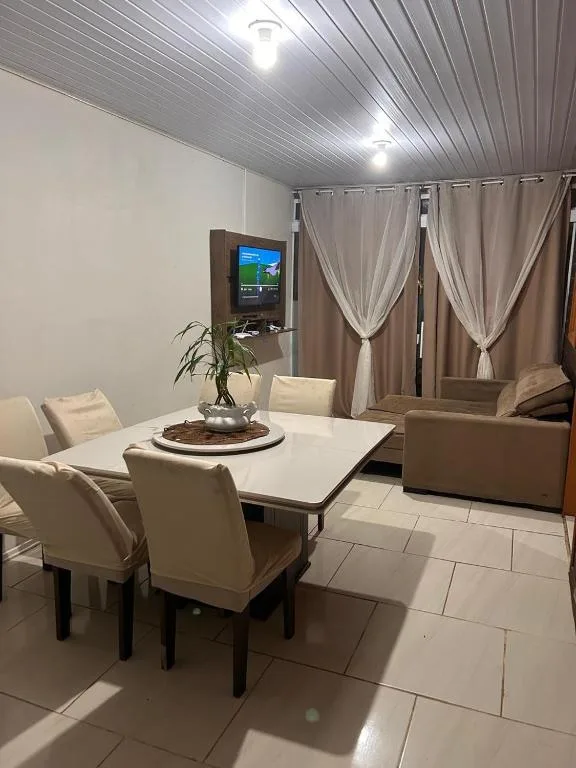 Casa com três quartos, piscina e área Gourmet, Torres, na Rua Dionel Ferro em Torres/RS — foto 5