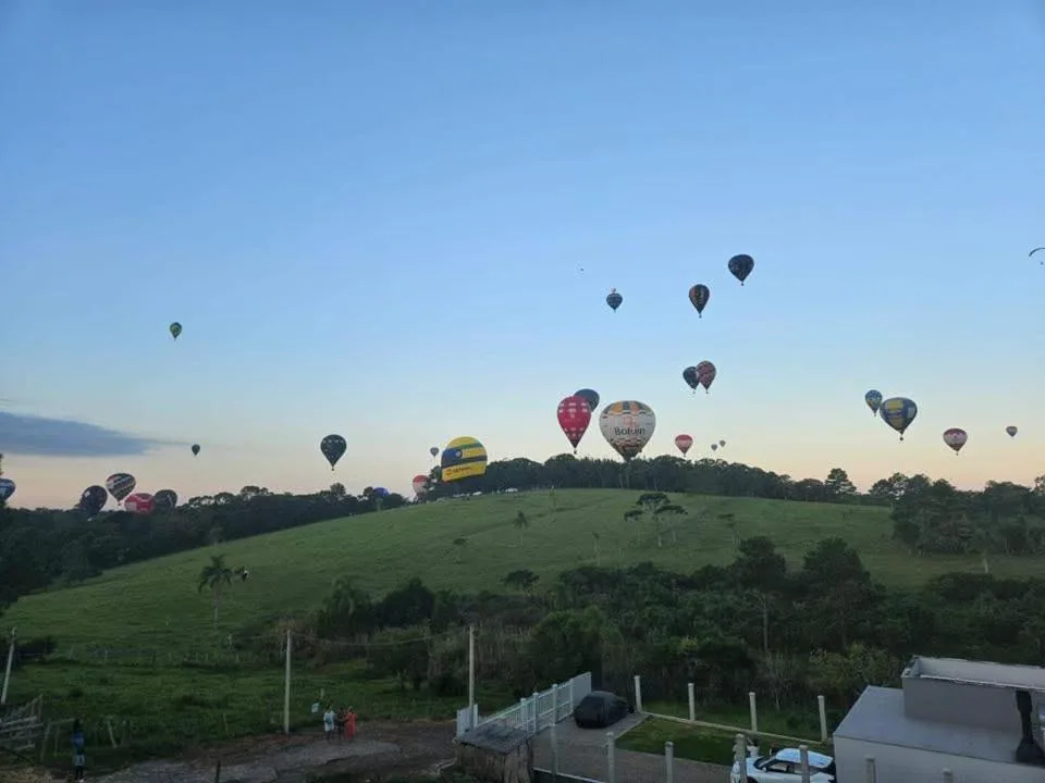 Casa com três quartos, piscina e área Gourmet, Torres, na Rua Dionel Ferro em Torres/RS — foto 9