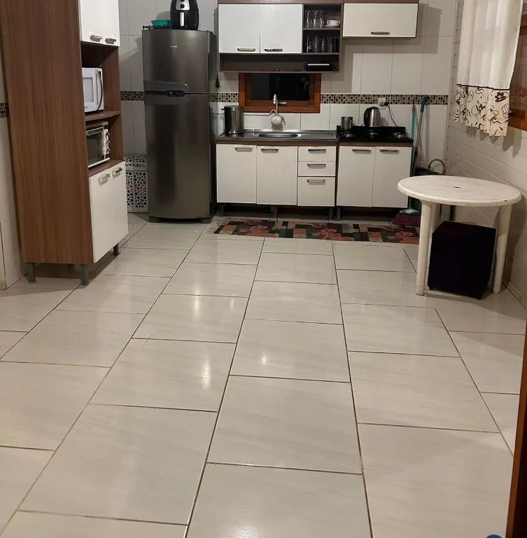 Casa com três quartos, piscina e área Gourmet, Torres, na Rua Dionel Ferro em Torres/RS — foto 12