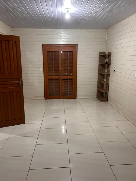Casa com três quartos, piscina e área Gourmet, Torres, na Rua Dionel Ferro em Torres/RS — foto 13
