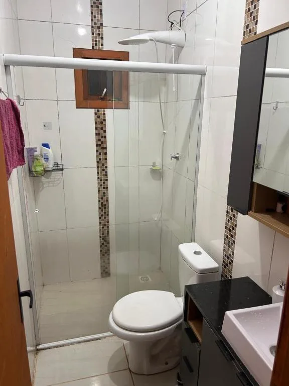 Casa com três quartos, piscina e área Gourmet, Torres, na Rua Dionel Ferro em Torres/RS — foto 14