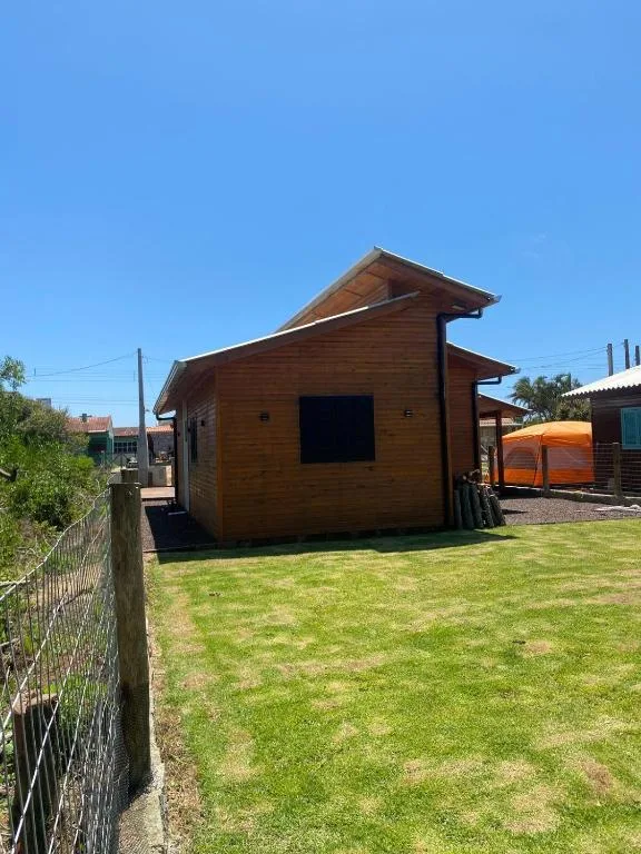 Casa Itapeva Torres 150m do mar com lareira, Torres, na Rua das Figueiras em Torres/RS — foto 6