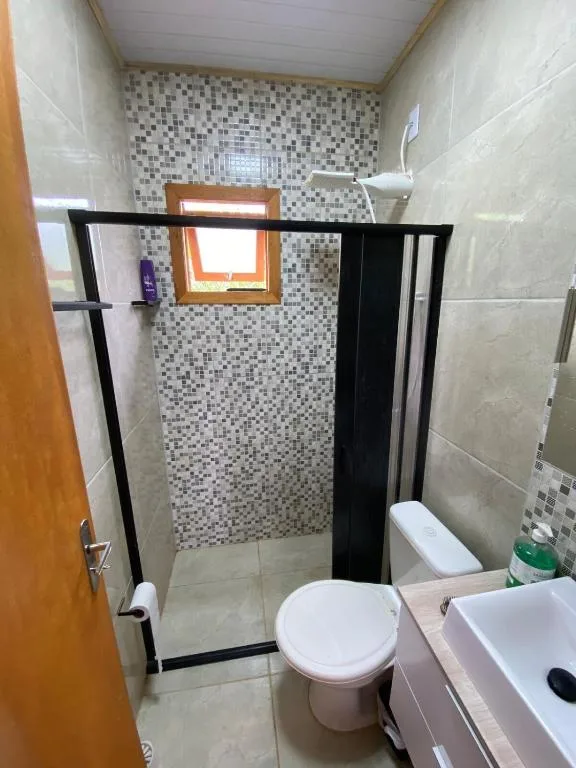 Casa Itapeva Torres 150m do mar com lareira, Torres, na Rua das Figueiras em Torres/RS — foto 8