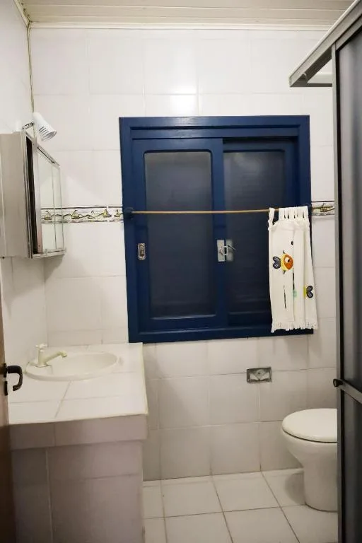 Casa com piscina patio e campinho em torres 1 quadra mar, Torres, na R. das Acácias em Torres/RS — foto 3