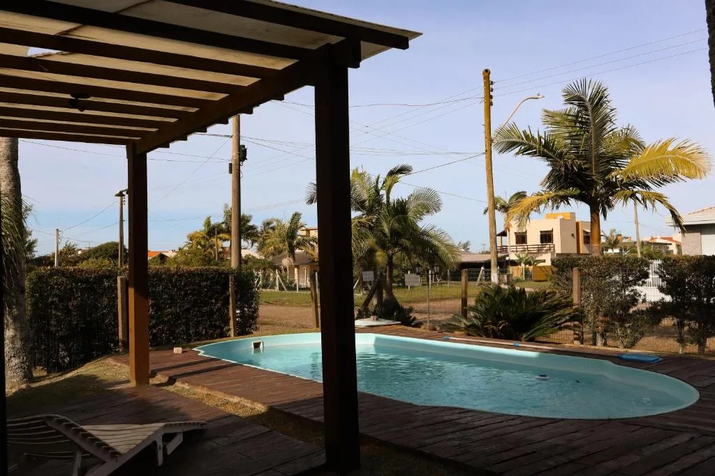 Casa com conforto e piscina em torres, Torres, na Rua Santa Vitória em Torres/RS — foto 4