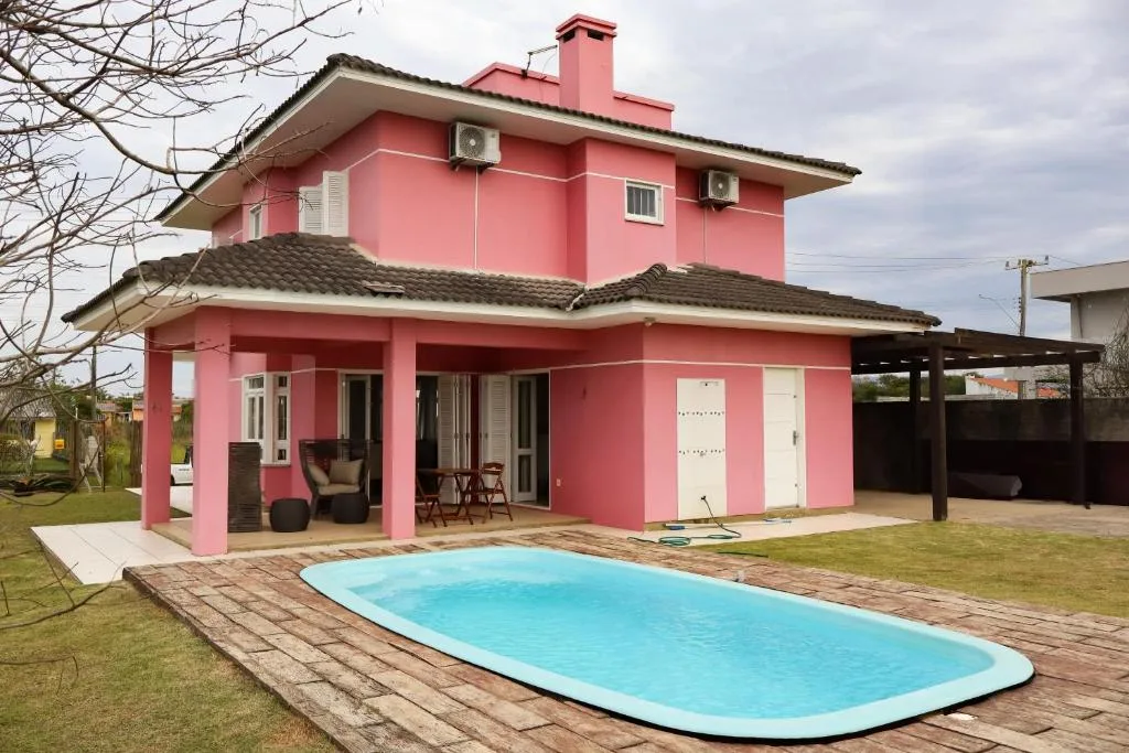 Casa completa com piscina a 1 quadra do mar em torres, Torres, na R. São Miguel em Torres/RS — foto 4