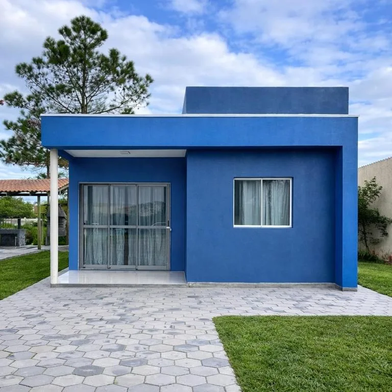 Casa com piscina perto das dunas e mar em Torres, Torres, na R. dos Sonhos em Torres/RS