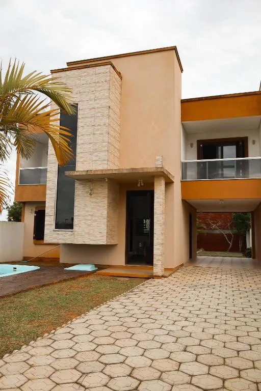 Casa com Piscina a 3 quadras do mar em Torres para 8 pessoas, Torres, na R. Santa Vitória em Torres/RS — foto 4