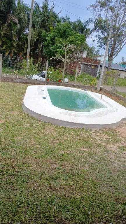 CASA com PISCINA EM TORRES 6 PESSOAS 2 QUADRAS DO MAR, Torres, na R. Luíz em Torres/RS — foto 3