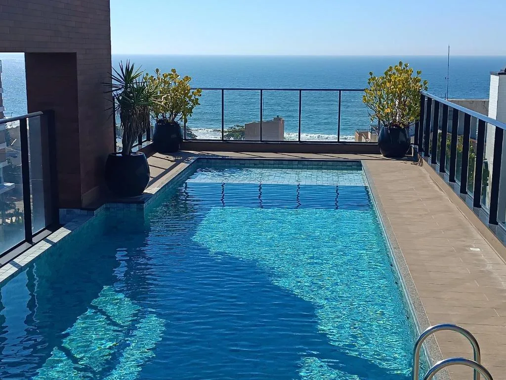 Estúdio incrível a180m da praia, piscina temperada, Bombinhas, na 48 Rua Pica Pau em Bombinhas/SC