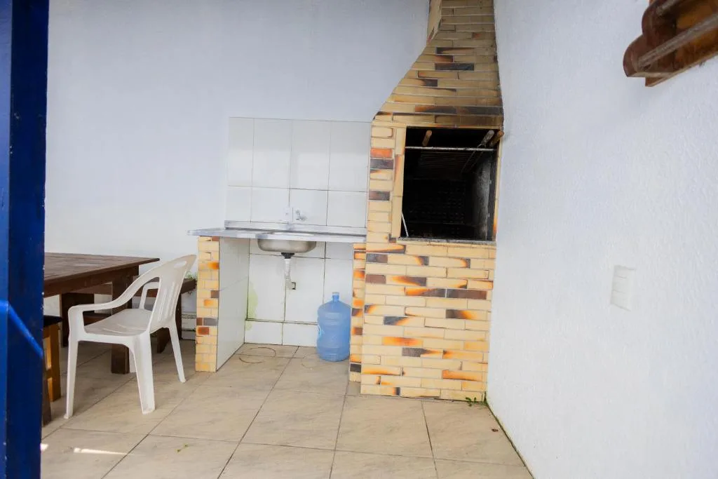 Bela e Aconchegante, Bombinhas, na Rua Golfinho Sobraados, casa com 2 pisos em Bombinhas/SC — foto 23
