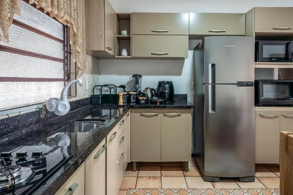 Casa completa para Familia e amigos com enxoval e varanda com churrasqueira e cozinha externa para ate 8 pessoas, Porto Belo, na Rua Maurilio Manoel da Silva, 184 casa em Porto Belo/SC — foto 7
