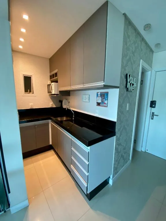 Apartamento em Prédio com Vista Mar encantadora - Praia, Piscina e Garagem, Balneário Camboriú, na 109 Rua João Francisco dos Santos em Balneário Camboriú/SC — foto 19