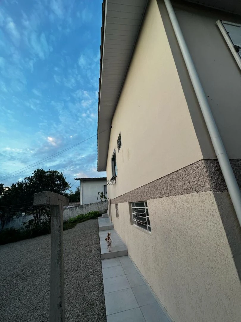 Casa com 3 Dormitórios sendo 1 suíte no bairro Estação em Urussanga/SC — foto 2